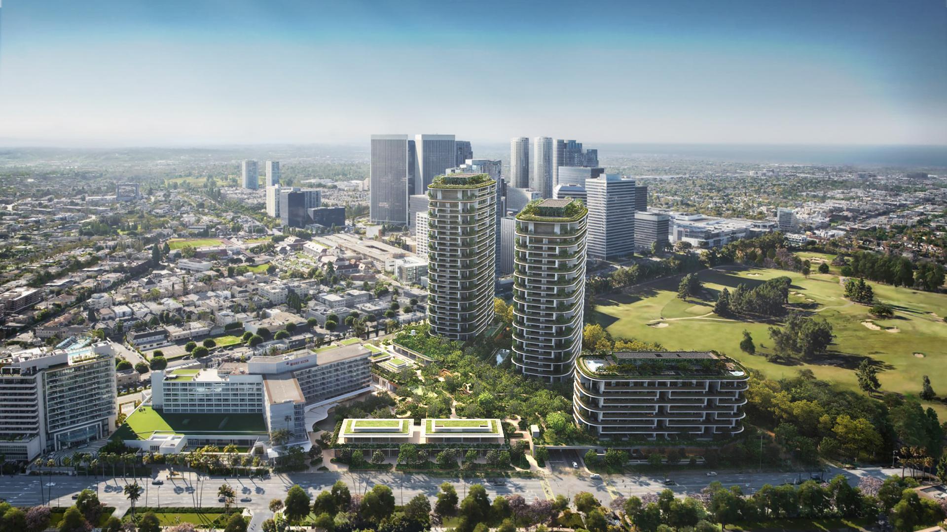 Aerial view of modern twin towers with rooftop greenery.