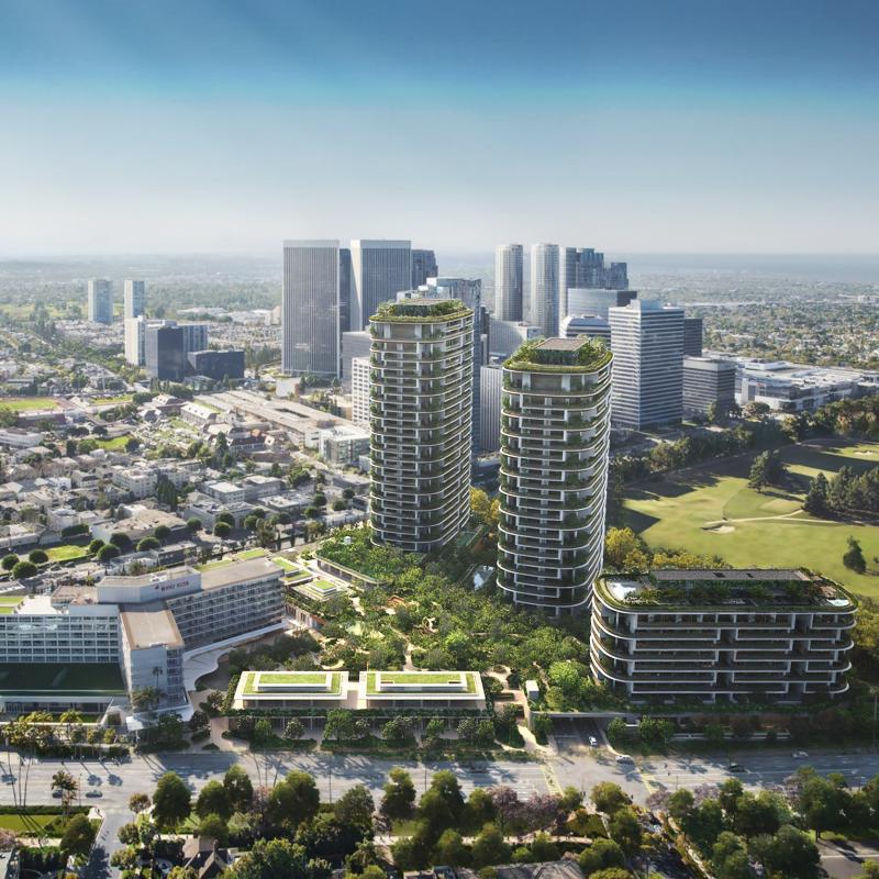 Aerial view of modern twin towers with rooftop greenery.